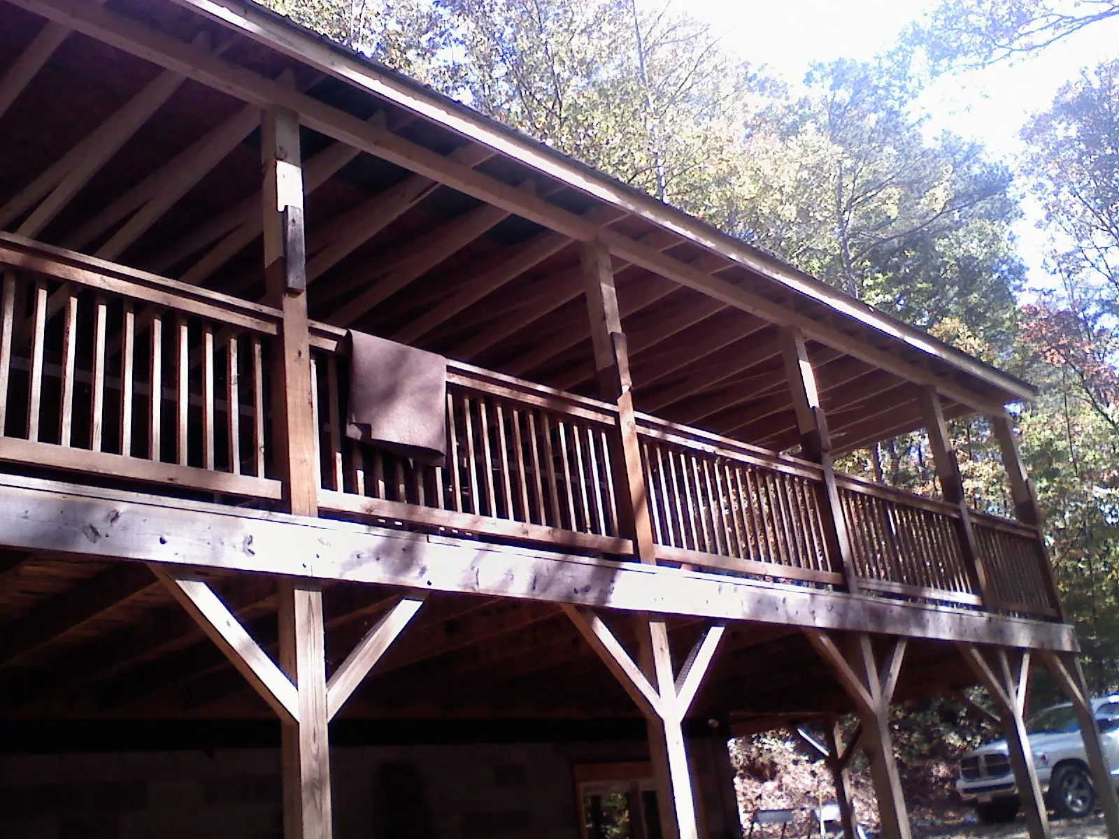 Timber framing under a new elevated porch and deck — Roof Leak Repair in Twin City by Roofing Brothers